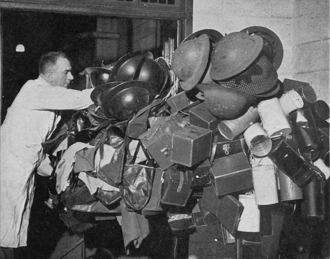 ondon Transport Lost Property Office in 1940 was stuffed full of gas masks and tin hats.jpg
