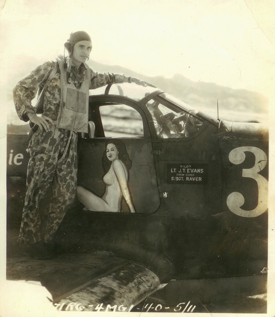 US Army HBT camo overall used as a flight suit. LT J.T. Evans with his P-39 GIRLIE NEW -GUINEA.jpg