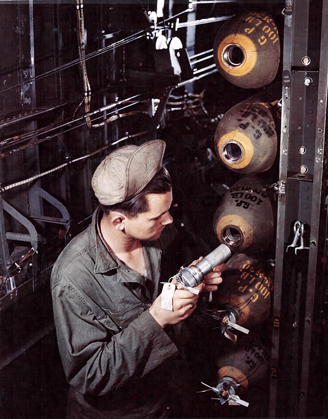 100_lb_bombs_already_in_the_bomb_bay_of_a_Consolidated_B-24_England.jpg