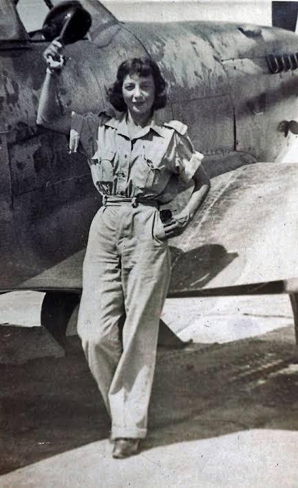 At 5’3” she was too small for many planes that were designed for men, and would use her parach...jpg