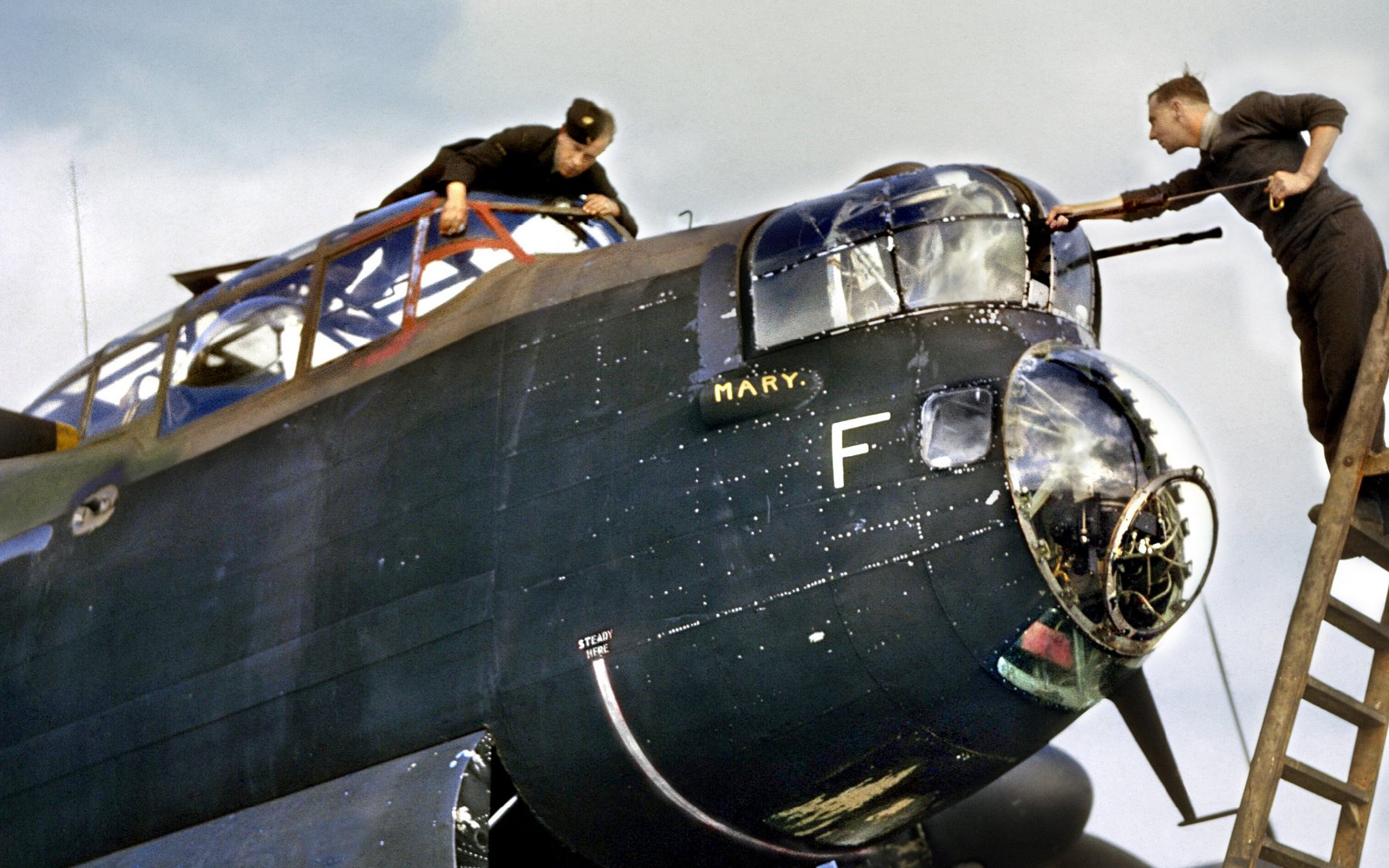 Avro Lancaster R5666 KM-F' of 44 ( Rhodesia) Squadron being cleaned October 1942.jpg