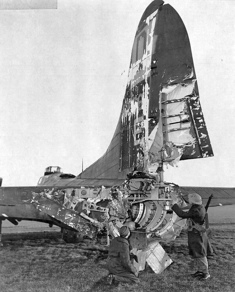 B-17 returned from Frankfurt raid after flak blew rear gunner Roy Urich out.jpg