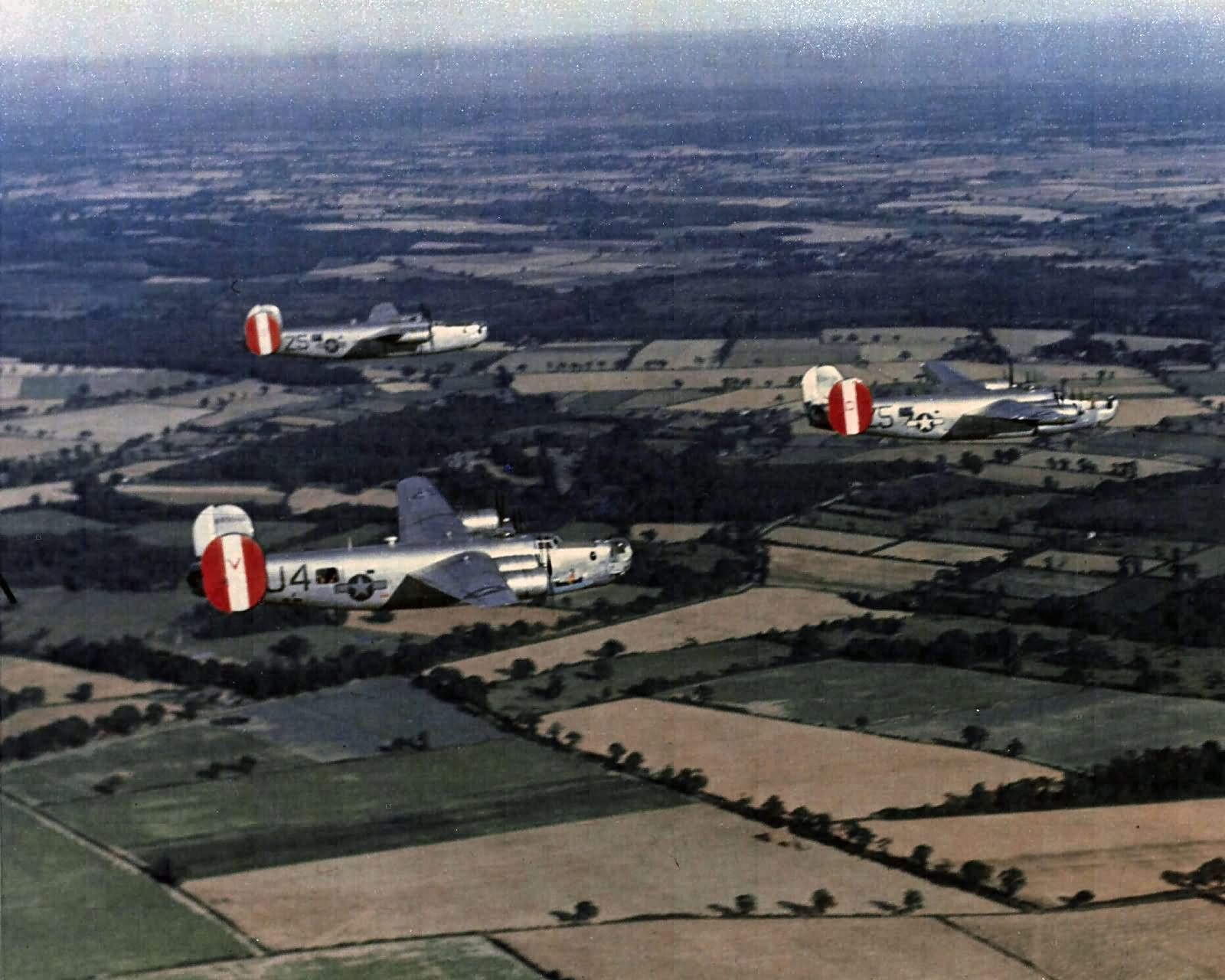 B-24_Liberator_8th_AAF_Flying_over_English_Countryside.jpg