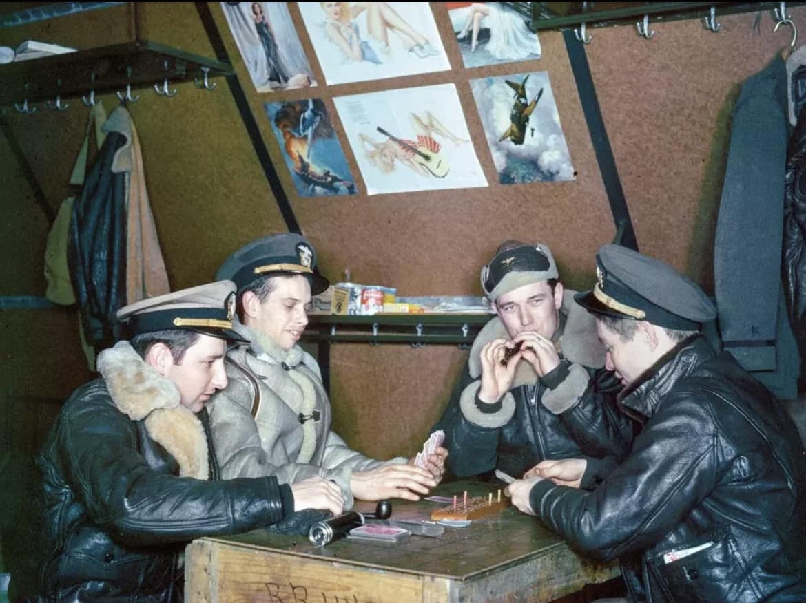 base in the Aleutian Islands, U.S. Navy aircrew amuse themselves with cribbage—and.jpg