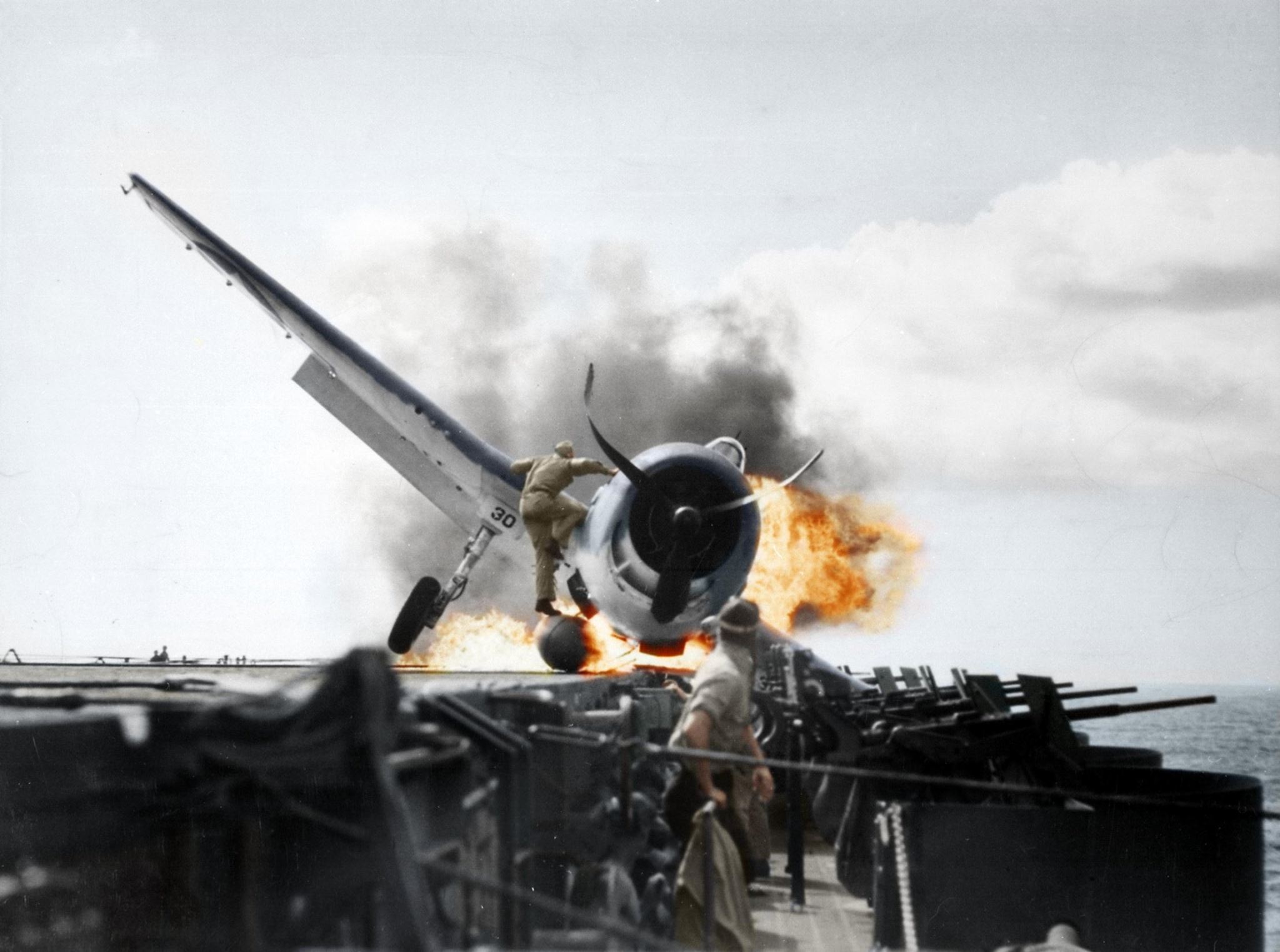 Crash landing of F6F-3 (VF-2), into the carrier's port side 20mm gun gallery, 1.jpg