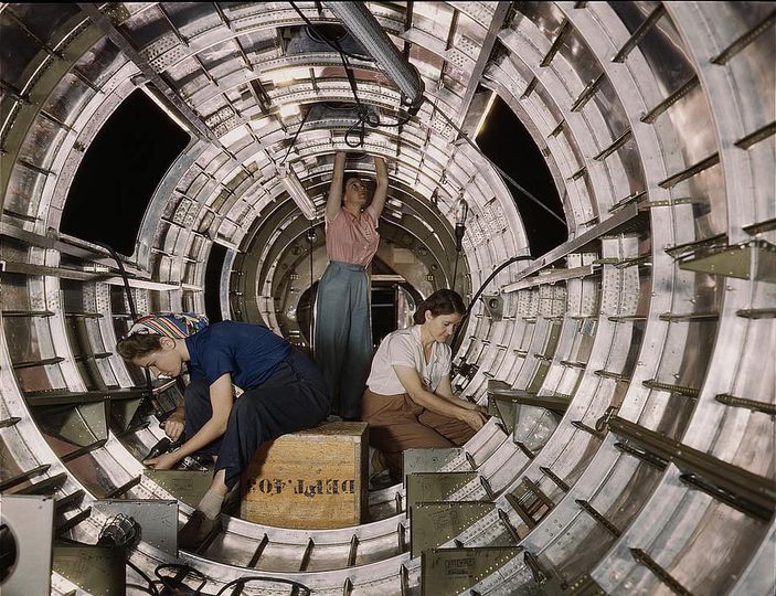 Female workers at Douglas Aircraft Co. installing components.jpg