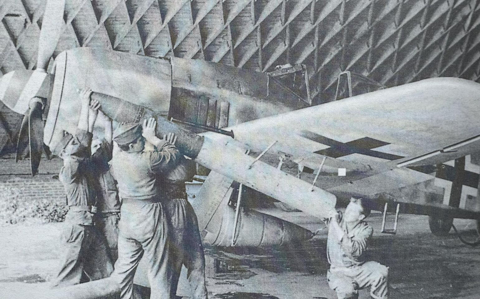 In May 1944, ground crew of JG26 based at Lille-Vandeville  are rearming a FW190 equipped with...jpg