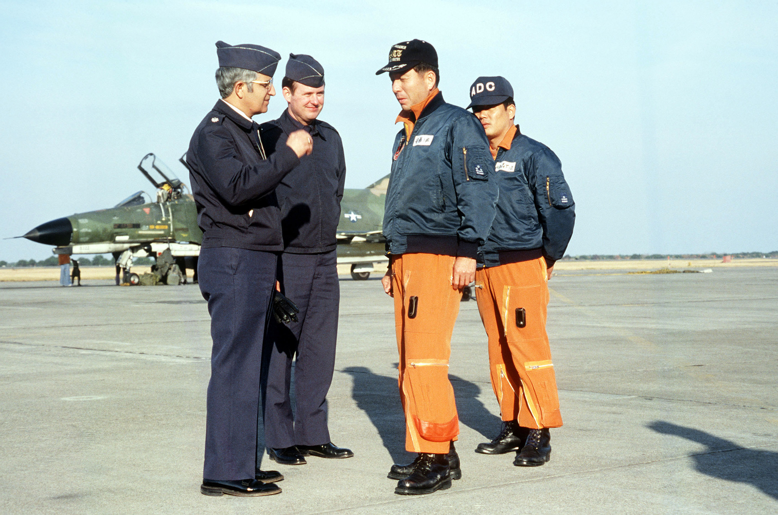 japanese-pilots-and-us-air-force-officers-discuss-operations-on-the-flight-20b72c-1600.jpg