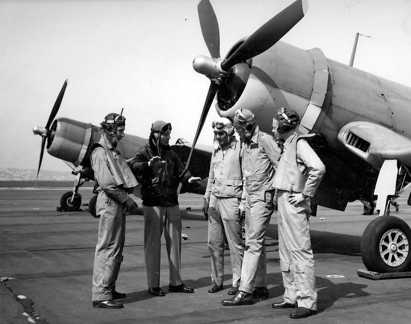LtCdr_Joseph_Clifton_and_pilots_of_VF-12_stand_in_front_of_F4U-1_Corsair_1943.jpg