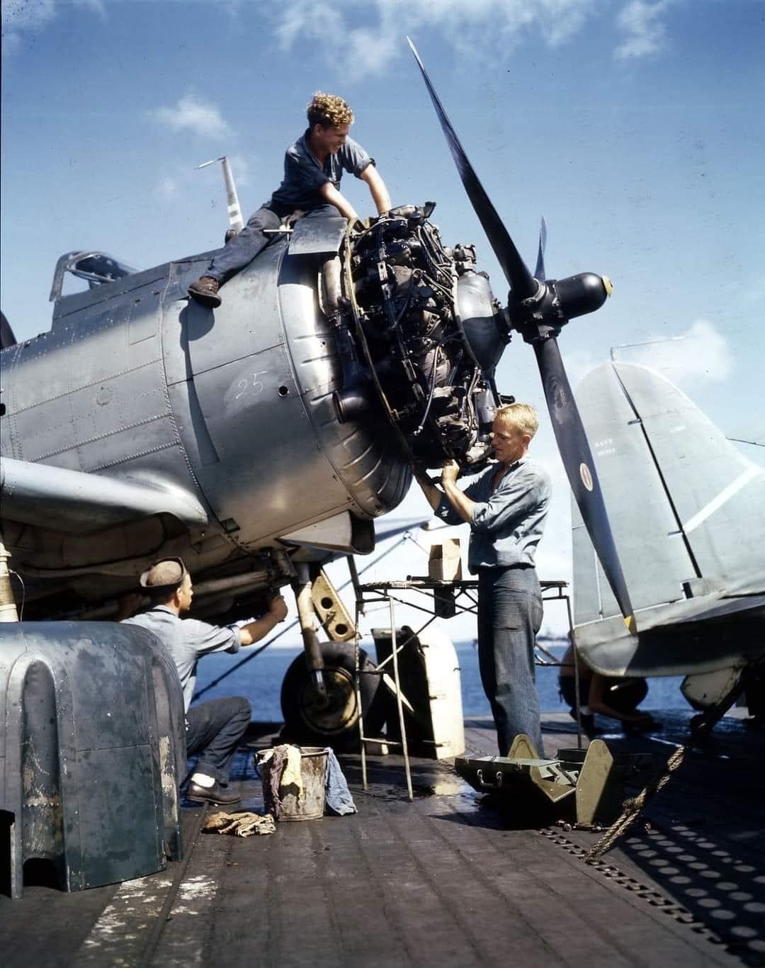 Mechanics Overhaul the Engine of Dauntless at sea.jpg