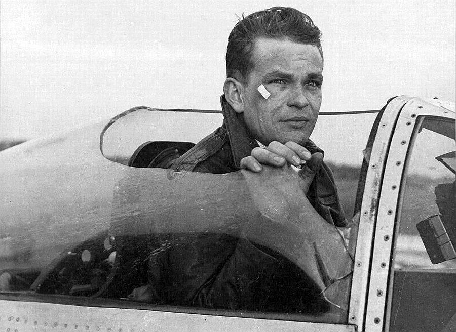 P-51 pilot Maj. Merle Gilbertson with flak damage to canopy.jpg