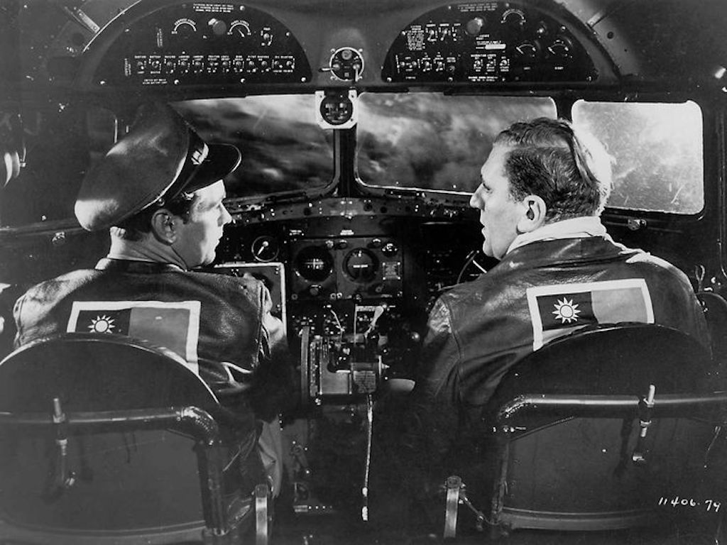 Pilot buddies (Alan Ladd, left, and William Bendix) fly the Chungking-to-Calcutta route in Cal...jpg