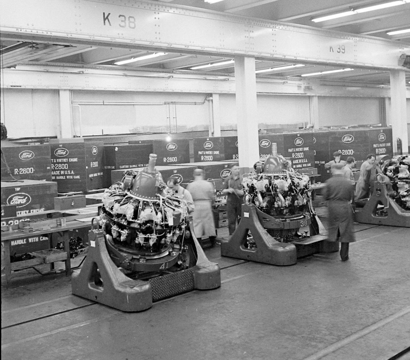 Pratt & Whitney R-2800 Double Wasp engines are prepared for shipment at the Ford Aircraft Engi...jpg