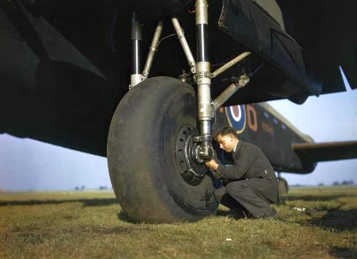 Testing the tyre pressure of Avro Lancaster.jpg